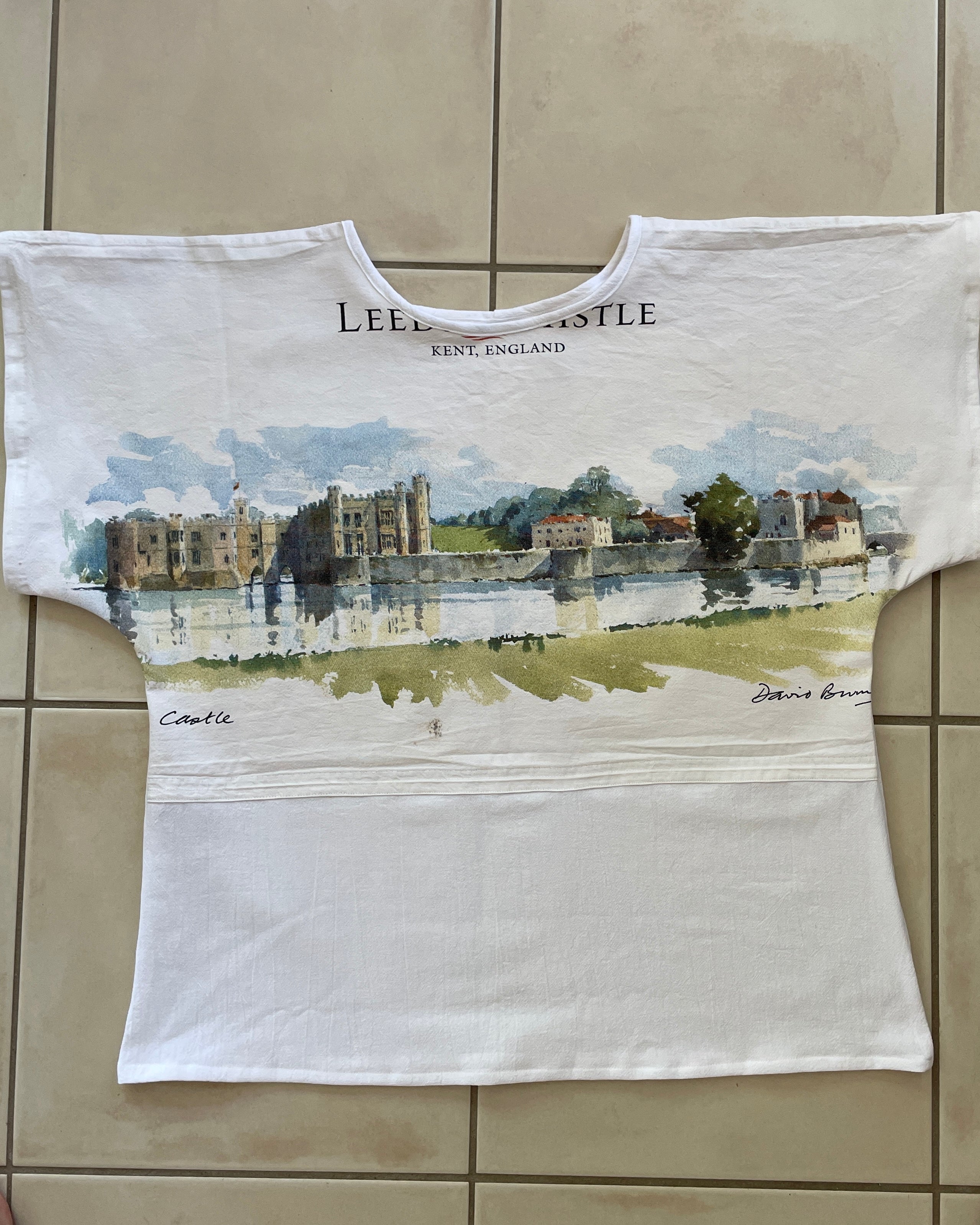 White t-shirt with a printed design of Leeds Castle, Kent, England.