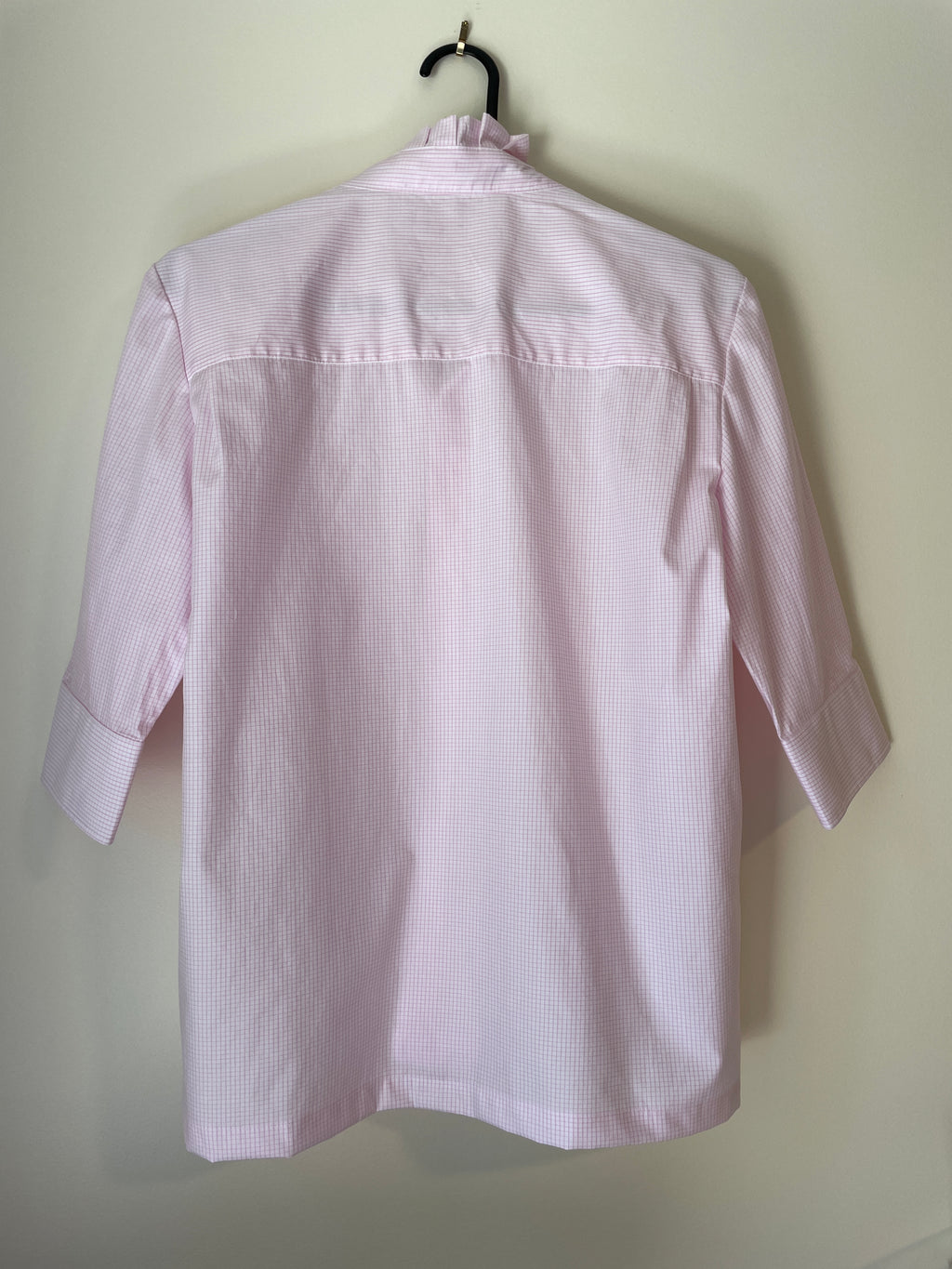 back view of pink striped shirt 
