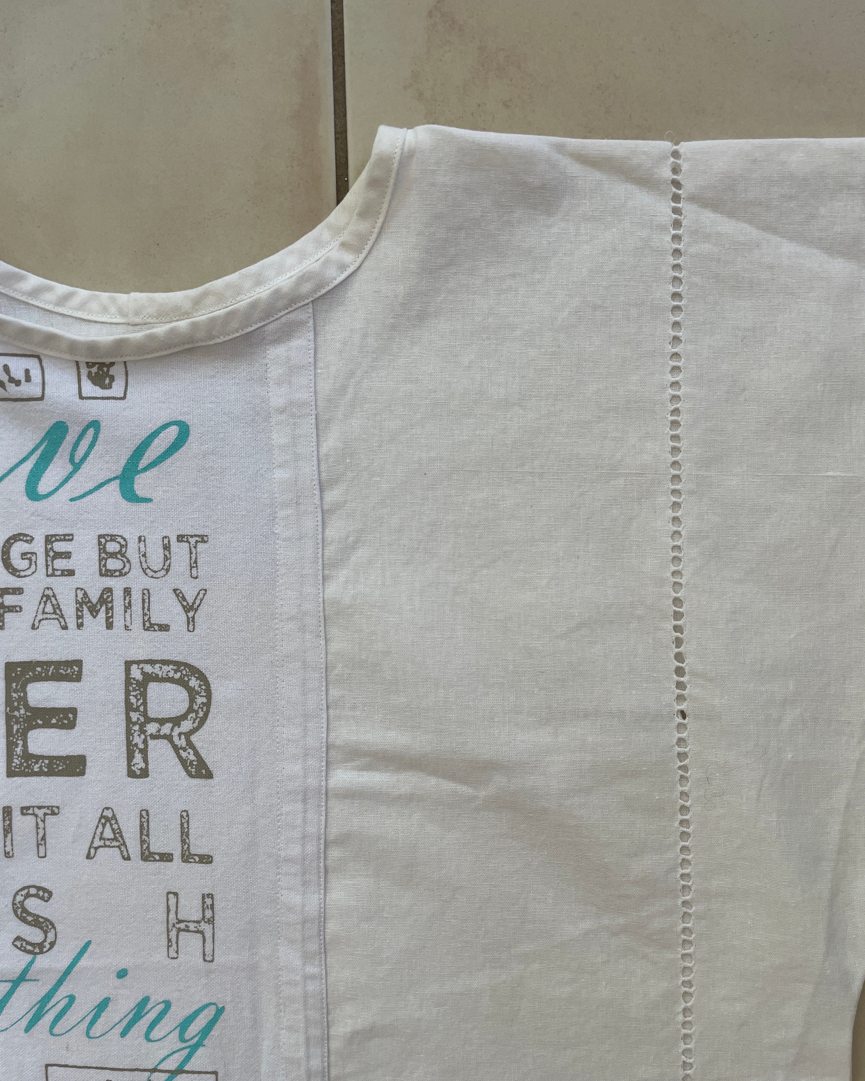 White tank top with text 