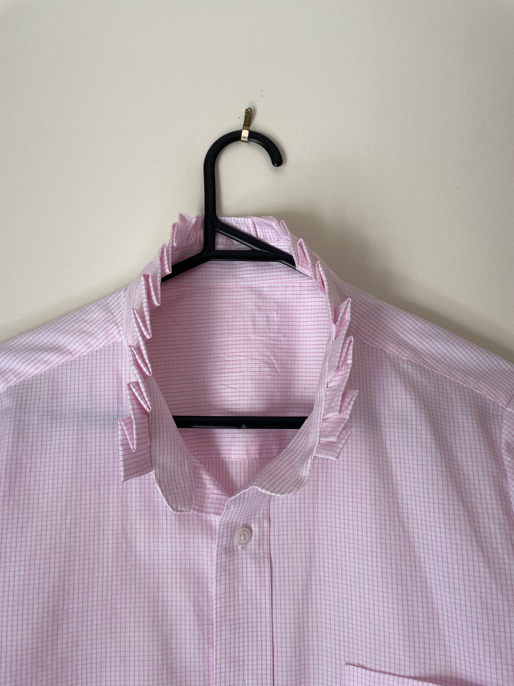 close up of pink striped shirt 