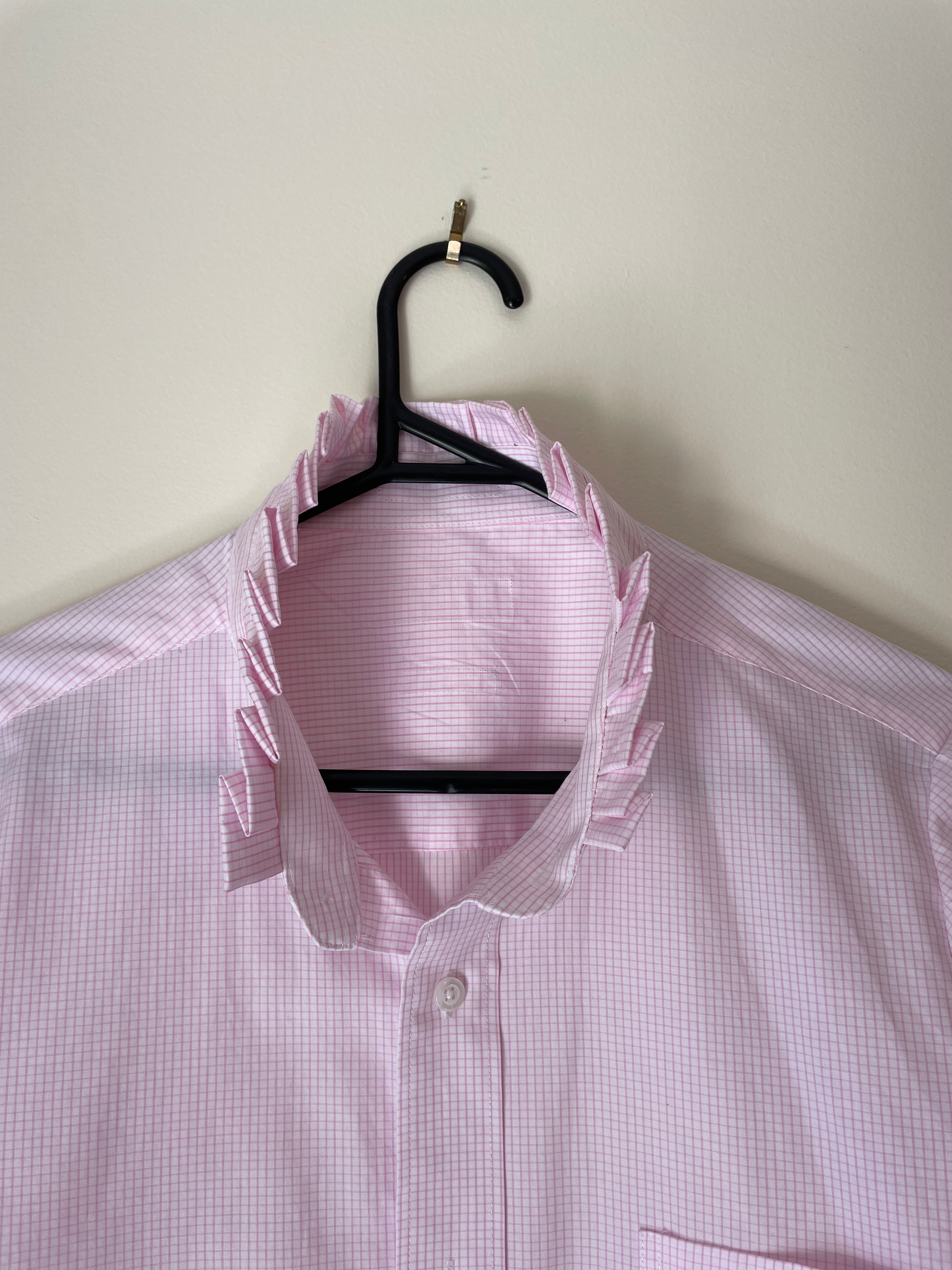 close up of pink striped shirt 