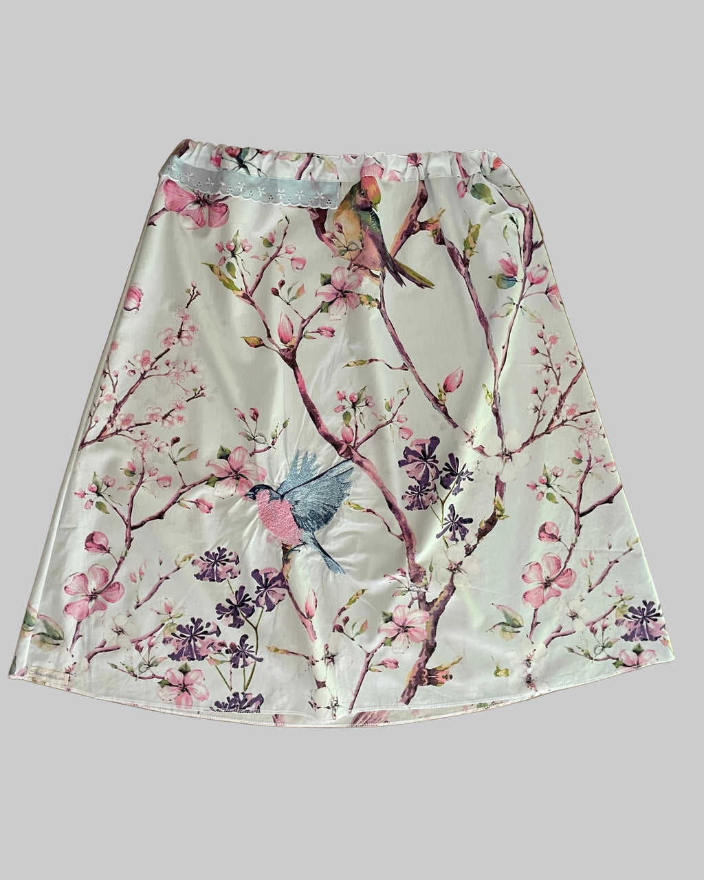 Skirt with floral and bird design 