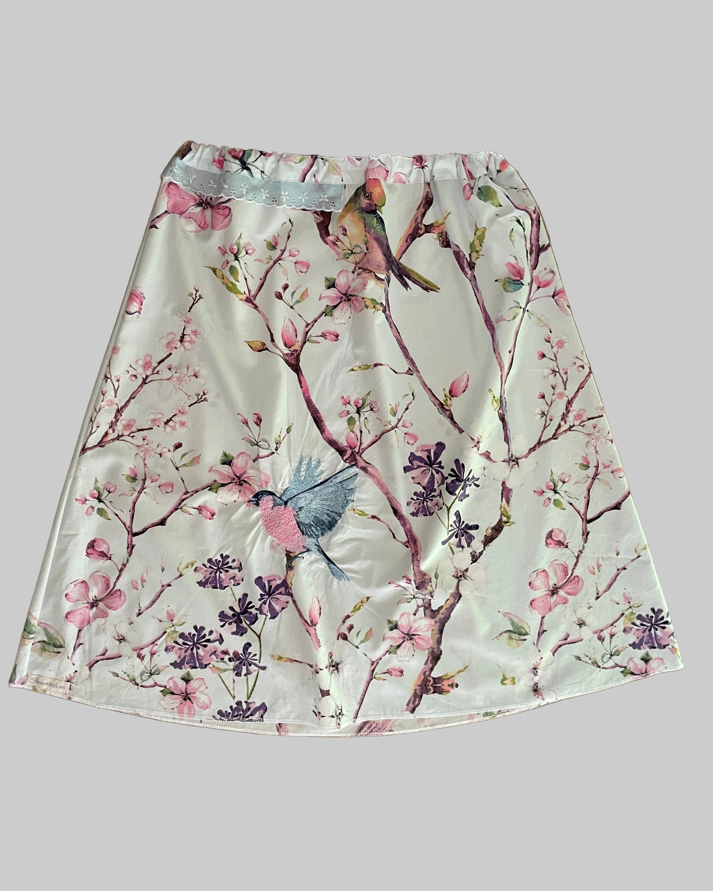 Skirt with floral and bird design 